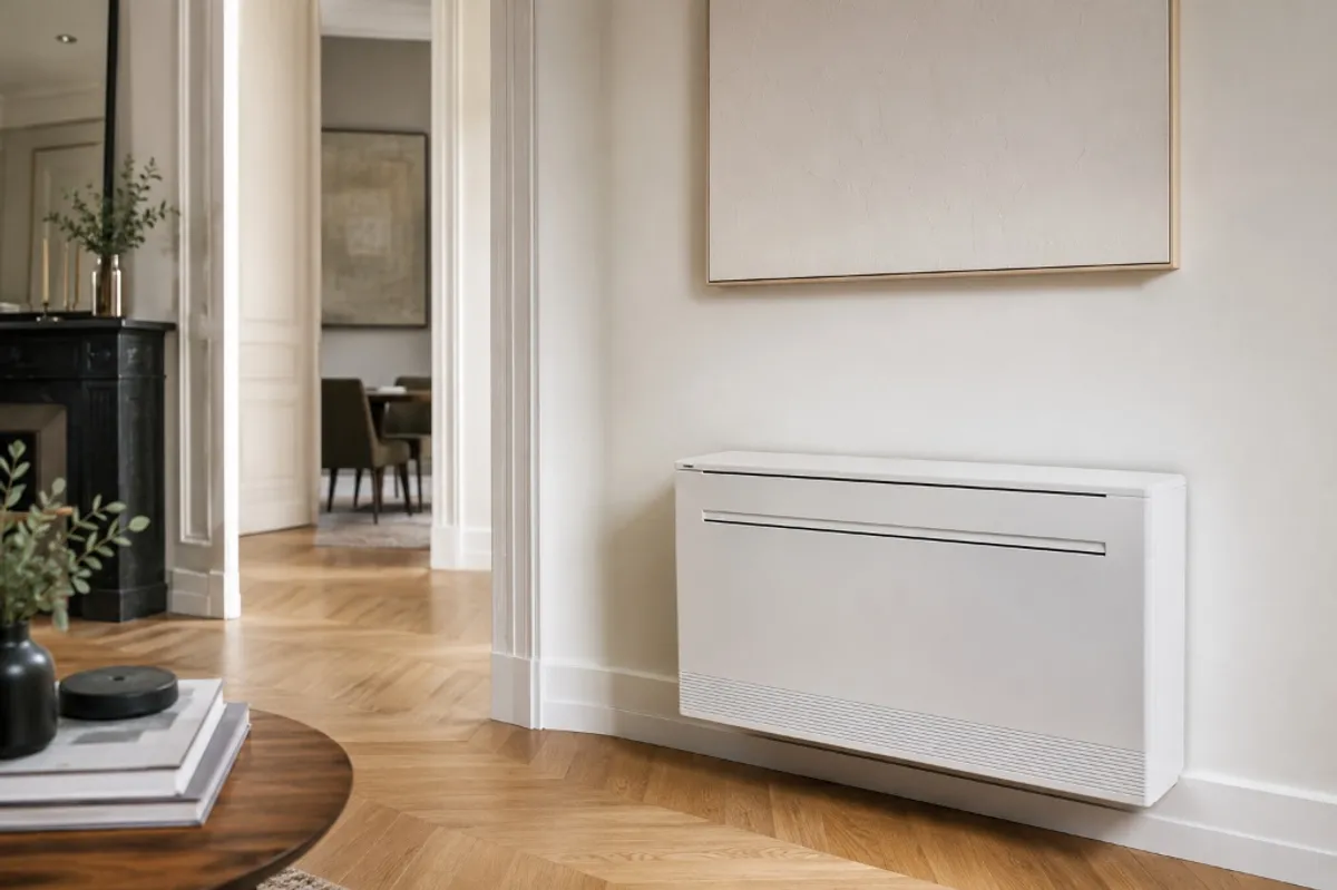 Unité de climatisation réversible monobloc design installée à l'intérieur d'un appartement sans groupe extérieur